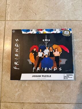 FRIENDS Jigsaw Puzzle with Red, Orange, Blue, Yellow and Pink Umbrellas